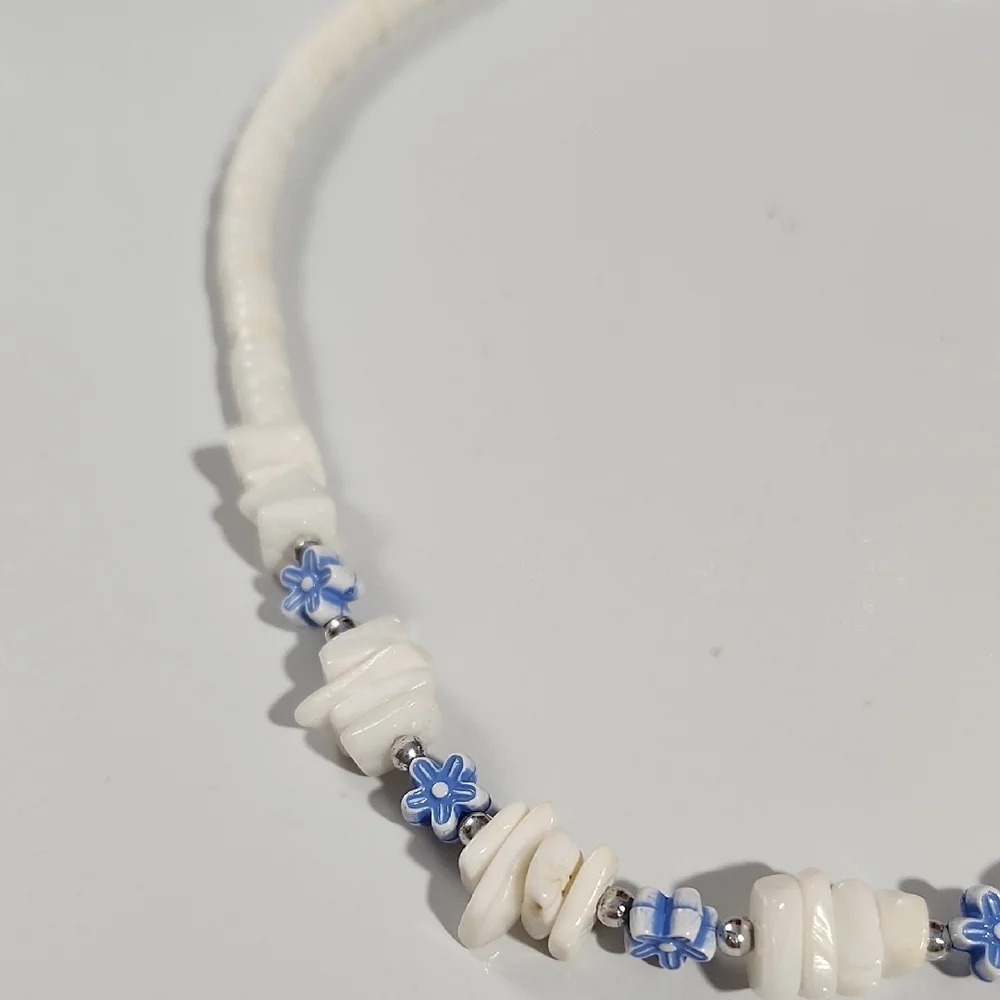 Puka Shell Necklace Blue Floral and Silver Accent Beads.